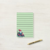 Gnome op rijdende grasmaaier met bloemenmand post-it® notes (Op bureau)