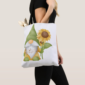 Gnome tenant un tournesol et notes sur un sac four