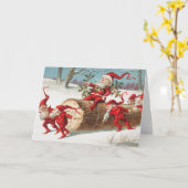 Gnomes dragging a cut tree trunk through the snow kaart (Gele Bloem)