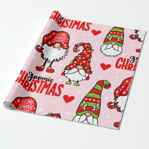 Gnomie Santa kijkt naar kerstinpakpapier Cadeaupapier