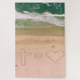 God staat gelijk aan LOVE, Jezus is Liefde, strand Legpuzzel