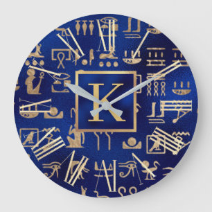 Gold Egyptian Hieroglyphics on Blue Intial Grote Klok