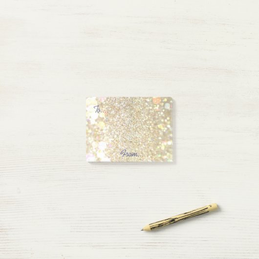 Gold glitter post notes (Op bureau)