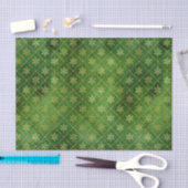 Gold kerstsnowflakes op groen tissuepapier (Craft)