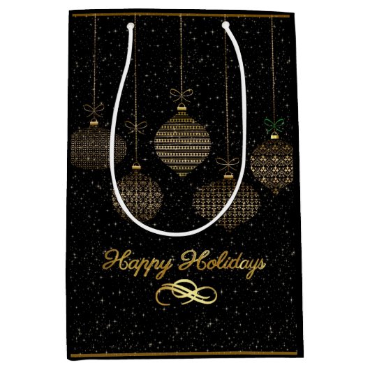 Gold lantern en stofzucht over zwarte achtergrond medium cadeauzakje (Voorkant)