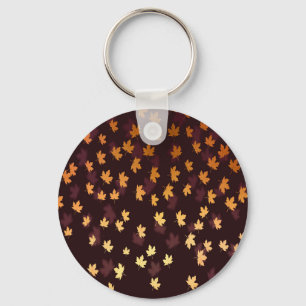 Gold Maple Leaf op donkerrood Sleutelhanger