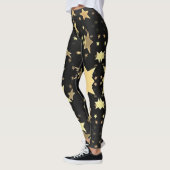Gold Stars op zwarte achtergrond Leggings (Links)