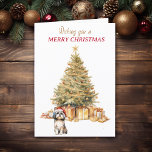 Gold Tree Shih Tzu Chien Carte de Noël<br><div class="desc">Sur le devant de cette carte de Noël, un adorable Chih Tzu Dog porte un chapeau de Père Noël rouge et blanc et est assis devant un arbre de Noël. L'arbre est décoré d'or, et les paquets cadeaux correspondants sont sous lui. Le texte en or et en rouge dit "Je...</div>