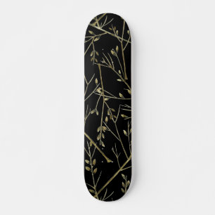 Gold Twigs on Black Skateboard
