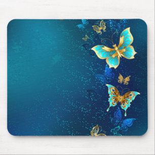 Golden Butterflies op een blauwe achtergrond Muismat