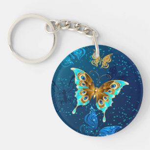 Golden Butterflies op een blauwe achtergrond Sleutelhanger