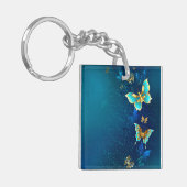 Golden Butterflies op een blauwe achtergrond Sleutelhanger (Voorkant Links)