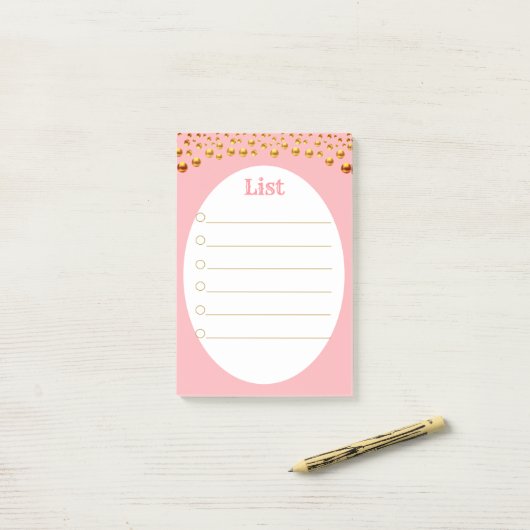 Golden Confetti op roze Post-it® Notes (Op bureau)