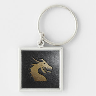 Golden drakensilhouet op zwart leder sleutelhanger