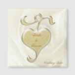 Golden Heart Wedding Favor Magnet<br><div class="desc">Coeur d'or précieux sur rose blanche floue l'arrière - plan décore cette belle faveur de mariage. Vous pouvez personnaliser l'ajout de noms et de date.</div>