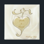 Golden Heart Wedding Favor Magnet<br><div class="desc">Coeur d'or précieux sur rose blanche floue l'arrière - plan décore cette belle faveur de mariage. Vous pouvez personnaliser l'ajout de noms et de date.</div>