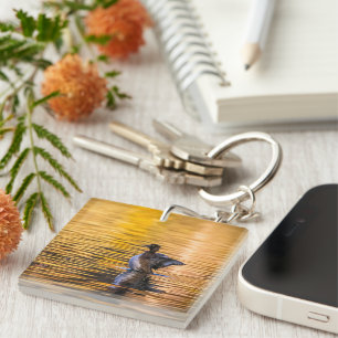 Golden oog op een gouden meer sleutelhanger