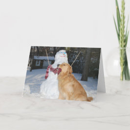 Golden Retriever bouwt sneeuwpop voor Feestdagen