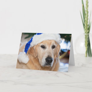 Golden retriever met het pet van santa in Kerstmis Feestdagen Kaart