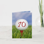 Golf 70th Birthday Party Invitation<br><div class="desc">Boule d'or blanche sur tee-shirt rouge dans l'herbe pour la fête de 70e anniversaire.</div>