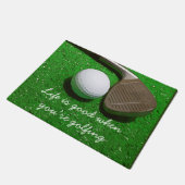 Golf Life is goed met golfbal op groene deurmat (Schuin)