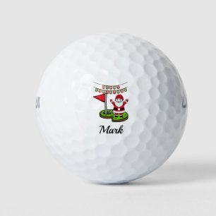 Golf vrolijk kerstfeest met kerstman bij vlag golfballen