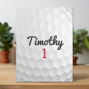 Golfbal indeukingen met zwarte naam rode nummer briefkaart