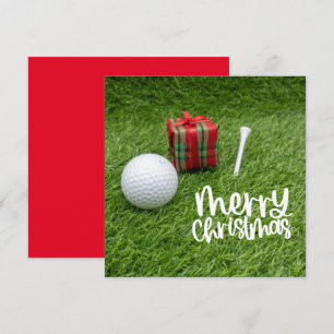 Golfbal met kerstt-shirt voor goudvakantie feestdagenkaart