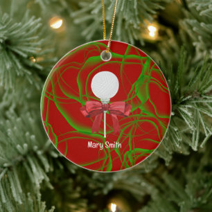 Golfbal met rood lint keramisch ornament
