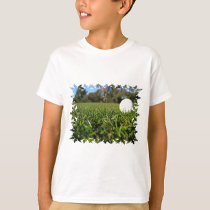 Golfbal op de T-shirt van de Jeugd van de Cursus