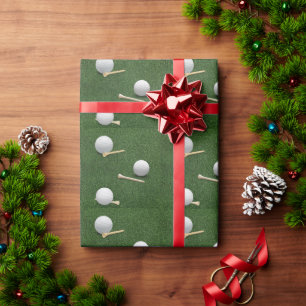 Golfballen op groen gras cadeaupapier