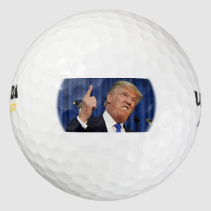Golfballen van Trump (met de vinger wijzen)