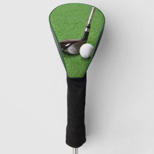 Golfclub en bal op een groene ondergrond Driver Golfheadcover