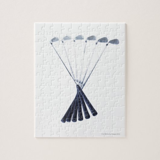 Golfclubs op witte achtergrond legpuzzel (Verticaal)