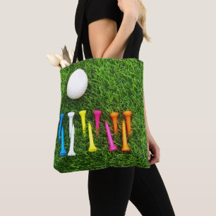 Golft - shirts zijn op groen gras. draagtas