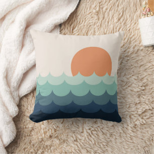 Golvende blauwe oceaan bij zonsondergang kussen