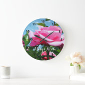 Gorgeous pink rose flower in blue sky. Floral Grote Klok (Huis)