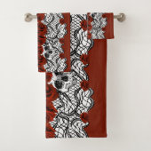 Gothische stijl, zwarte kant, schedels en rode roz bad handdoek (Insitu)