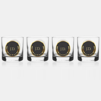 Goud en zwart whiskey glas