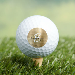 Goud geborsteld metaal zwart wit schrift monogram golfballen