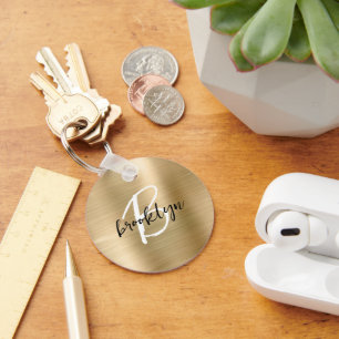 Goud geborsteld metaal zwart wit schrift monogram  sleutelhanger