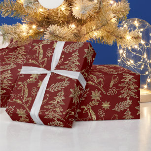 Goud op donkerrood kerstsymbolen patroon cadeaupapier