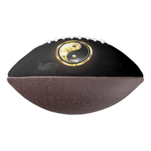 Goud Yin Yang op zwart American Football