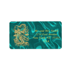 Gouddraak in reliëf op Turquoise Satin Print Etiket