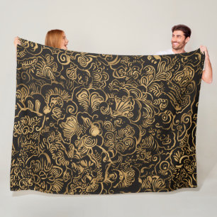 Gouden bloempatroon in barokstijl op zwart fleece deken