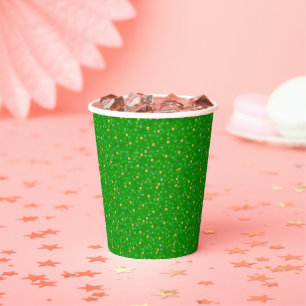 Gouden confetti op groene glitters papieren bekers