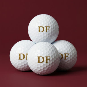 Gouden gegraveerde golfballen