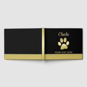 Gouden glanzende hondenpoot op zwarte achtergrond gastenboek (Volledig)