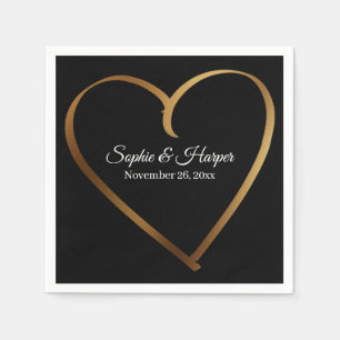 Gouden hart rond details, op zwart servet
