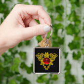 GOUDEN KELTISCHE HARTSIERADEN MET ROBIJN EDELGESTE SLEUTELHANGER (Hand)